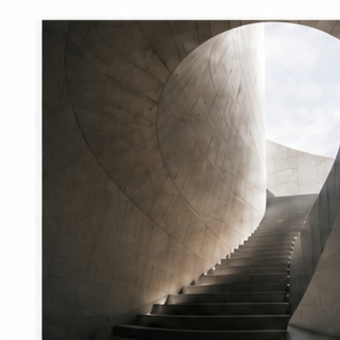 Architectural concrete stairwell in warm natural light.